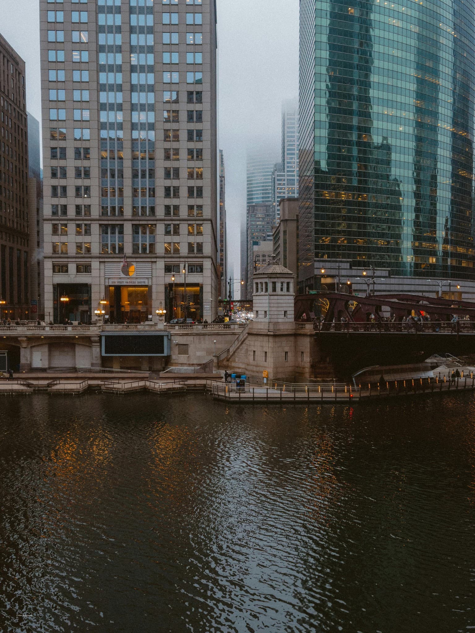 Chicago river and downtown buildings at dusk